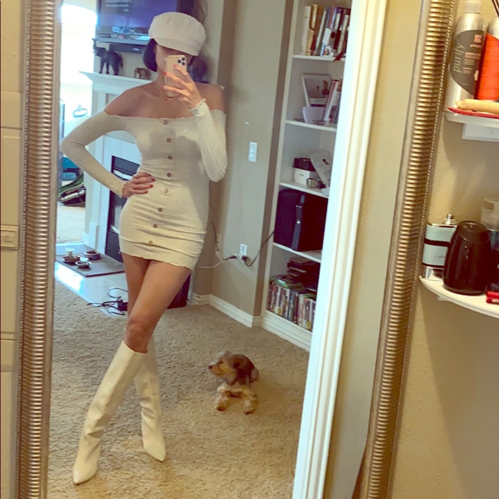 Knit dress $70, boots $240, hat $50